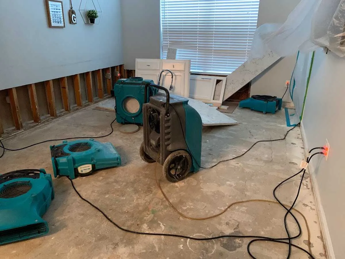 Dehumidifier in flood-cut room for Water Damage Restoration in Neenah